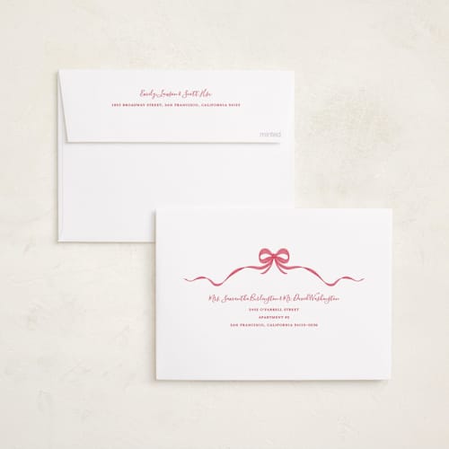 This is a poinsettia holiday photo cards with standard by Anne Ciotola called one red bow printing on recycled smooth signature in standard