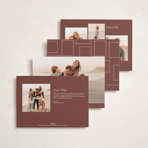 This is a maroon holiday photo cards with standard by Gwen Bedat called return address printing on recycled smooth signature in standard