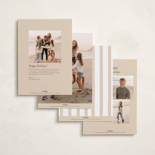 This is a ivory holiday photo cards with standard by Angela Thompson called triple frame printing on recycled smooth signature in standard