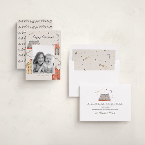 This is a vanilla holiday photo cards with standard by Sarah Rosenthal called festive town printing on recycled smooth signature in standard