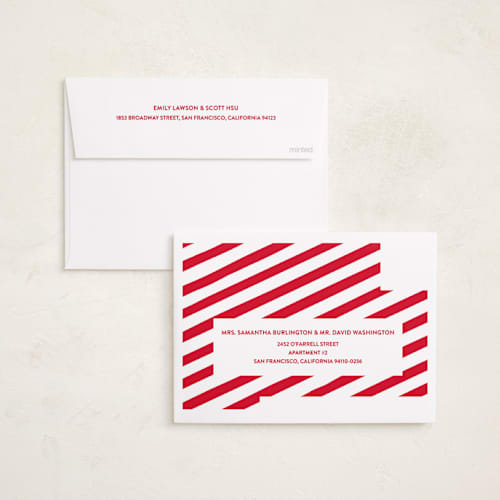 This is a holly holiday photo cards with standard by The Social Type called naughty holiday dog printing on recycled smooth signature in standard