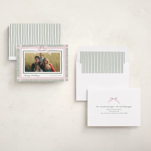 This is a pink sand holiday photo cards with standard by Chris Griffith called holiday wrap printing on recycled smooth signature in standard