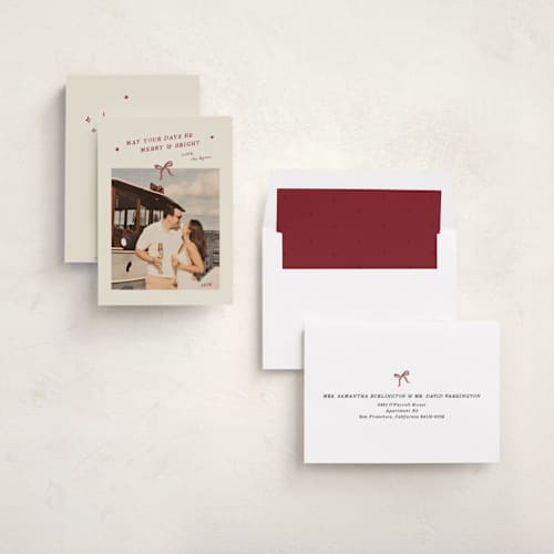 This is a cinnamon holiday photo cards with standard by Ani Somi called merry little bow printing on recycled smooth signature in standard