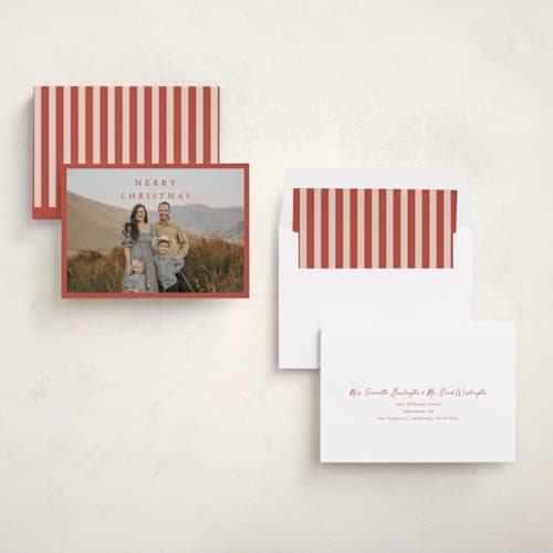 This is a holly berry holiday photo cards with standard by Kasia Labocki called homebound printing on recycled smooth signature in standard