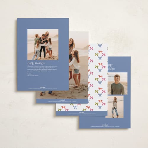 This is a buttercream holiday photo cards with standard by Erika Firm called paperchain border printing on recycled smooth signature in standard