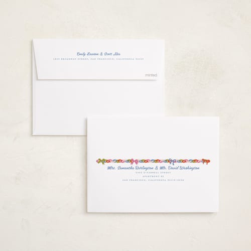 This is a buttercream holiday photo cards with standard by Erika Firm called paperchain border printing on recycled smooth signature in standard
