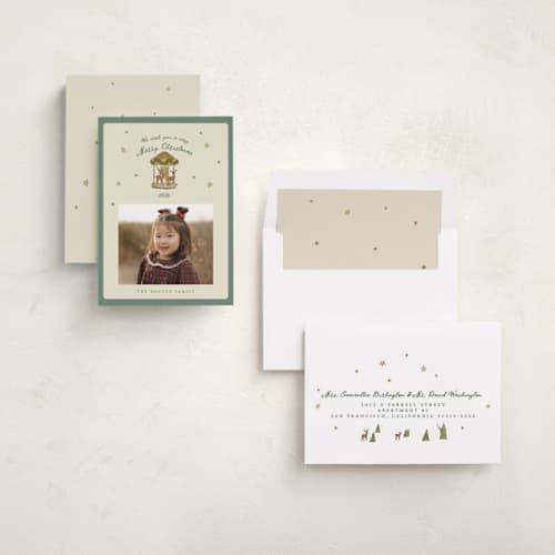 This is a pine holiday photo cards with standard by Bailamor Design by CM called carousel printing on recycled smooth signature in standard