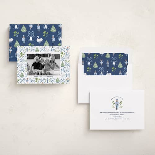 This is a blue ribbon holiday photo cards with standard by Sarah Knight called nutcracker ribbons printing on recycled smooth signature in standard