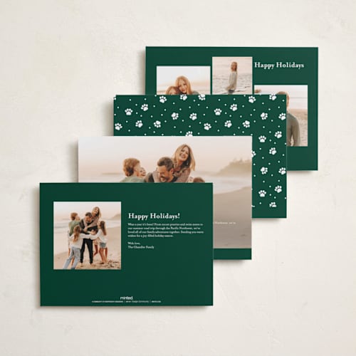 This is a wintergreen holiday photo cards with standard by Everett Paper Goods called here comes santa paws printing on recycled smooth signature in standard