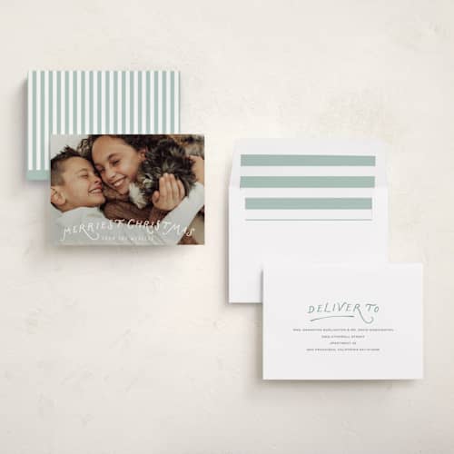 This is a snow holiday photo cards with standard by Sara Hicks Malone called festive arch printing on recycled smooth signature in standard