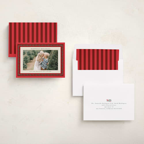 This is a holly berry holiday photo cards with standard by Kristie Kern called revelry printing on recycled smooth signature in standard