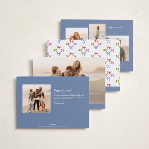 This is a buttercream holiday photo cards with standard by Erika Firm called paperchain border printing on recycled smooth signature in standard