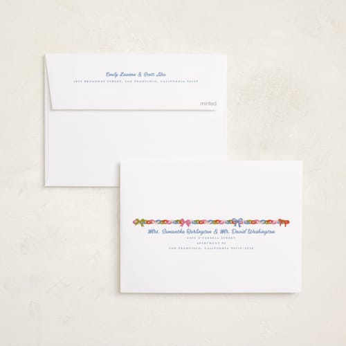 This is a buttercream holiday photo cards with standard by Erika Firm called paperchain border printing on recycled smooth signature in standard