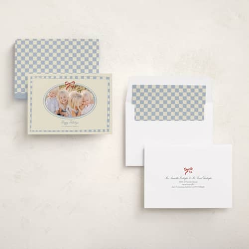 This is a celestial holiday photo cards with standard by Helena Vitto called little bow printing on recycled smooth signature in standard