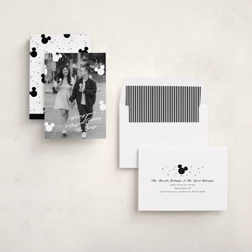 This is a snow holiday photo cards with standard by Pixel and Hank called disney's mickey magical holiday printing on recycled smooth signature in standard