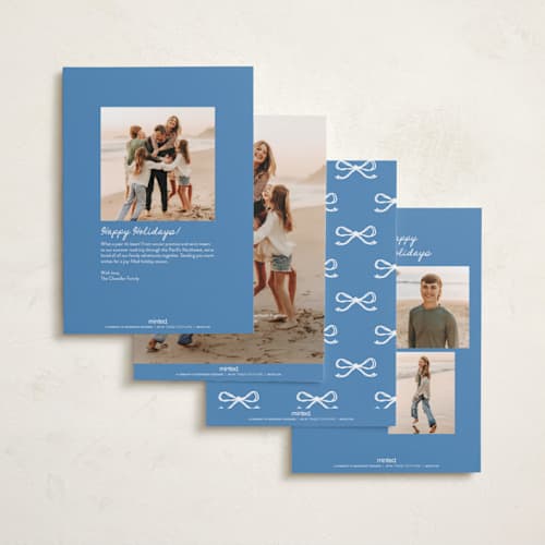 This is a blue spruce holiday photo cards with standard by Kelly Watkins called mini bow printing on recycled smooth signature in standard