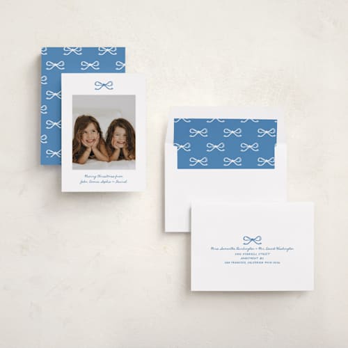 This is a blue spruce holiday photo cards with standard by Kelly Watkins called mini bow printing on recycled smooth signature in standard