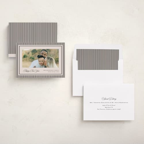 This is a linen holiday photo cards with standard by Kelly Schmidt called striped elegance printing on recycled smooth signature in standard