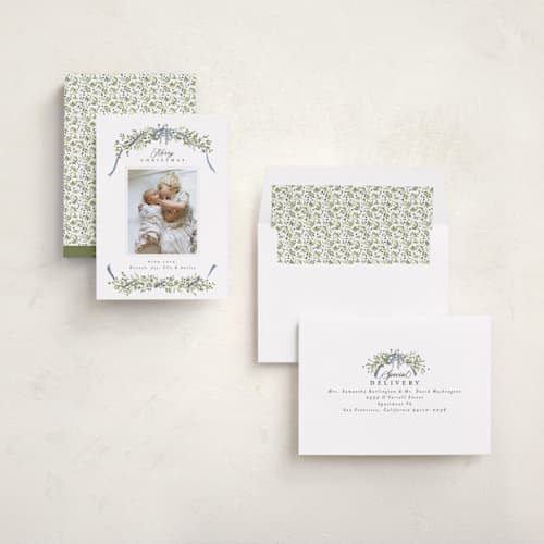 This is a blue spruce holiday photo cards with standard by Everett Paper Goods called boughs of pine printing on recycled smooth signature in standard