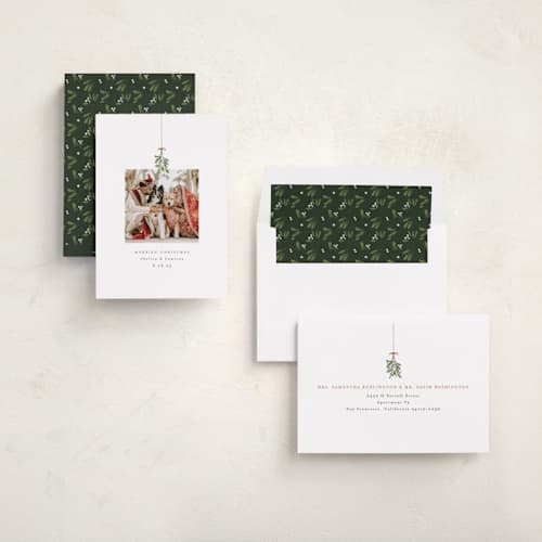 This is a winter holiday photo cards with standard by Randi Cirelli called married and merry printing on recycled smooth signature in standard
