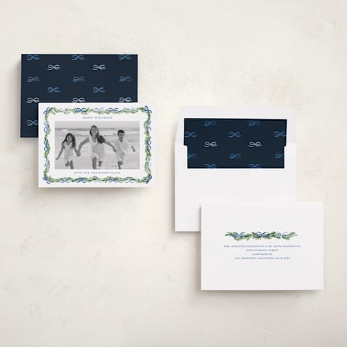 This is a frosted holiday photo cards with standard by Sarah Knight called boughs of bows printing on recycled smooth signature in standard