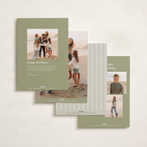 This is a greenery holiday photo cards with standard by Heather Cairl called all evergreen printing on recycled smooth signature in standard