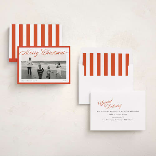 This is a poppy holiday photo cards with standard by Chris Griffith called holiday play printing on recycled smooth signature in standard