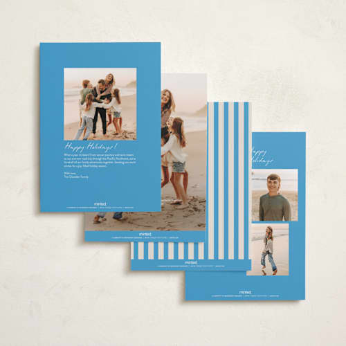 This is a electric blue holiday photo cards with standard by Morgan Kendall called topsy turvy printing on recycled smooth signature in standard