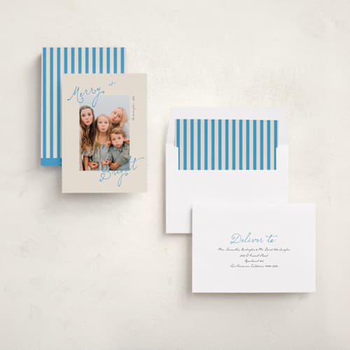 This is a electric blue holiday photo cards with standard by Morgan Kendall called topsy turvy printing on recycled smooth signature in standard