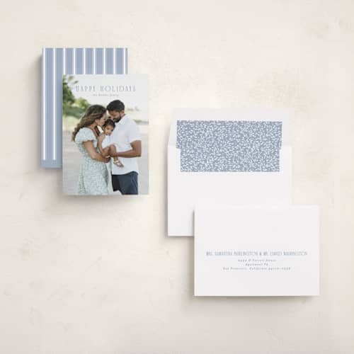 This is a powder blue holiday photo cards with standard by Erin L. Wilson called seabreeze printing on recycled smooth signature in standard