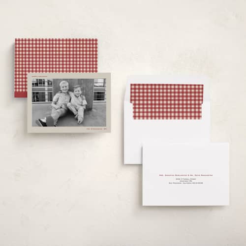 This is a holly holiday photo cards with standard by Grae called our merriest holidays printing on recycled smooth signature in standard