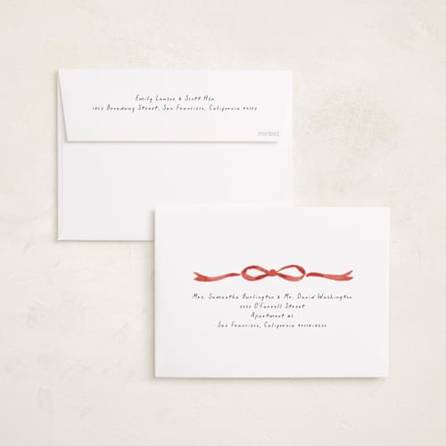 This is a peppermint holiday photo cards with standard by Laura Hankins called painted bow printing on recycled smooth signature in standard