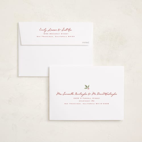 This is a holly berry holiday photo cards with standard by Wildfield Paper Co called eucalyptus + holly printing on recycled smooth signature in standard