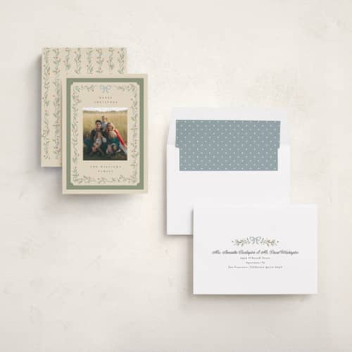 This is a mistletoe holiday photo cards with standard by Robert and Stella called christmas greenery printing on recycled smooth signature in standard