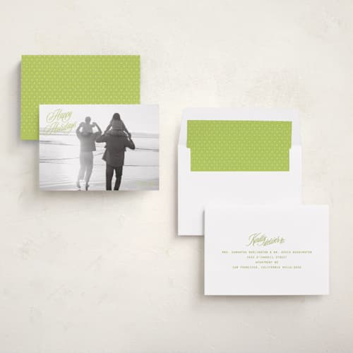 This is a mistletoe glow holiday photo cards with standard by JoAnn Jinks called neon vintage printing on recycled smooth signature in standard