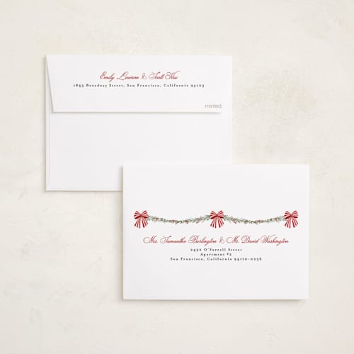 This is a candy cane holiday photo cards with standard by Susan Moyal called holly & bows printing on recycled smooth signature in standard