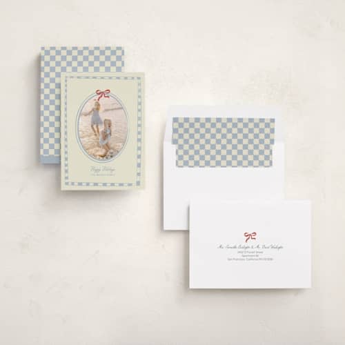 This is a celestial holiday photo cards with standard by Helena Vitto called little bow printing on recycled smooth signature in standard