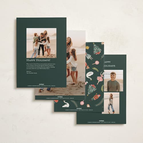 This is a holly leaf holiday photo cards with standard by Sarah Knight called nutcracker dance printing on recycled smooth signature in standard