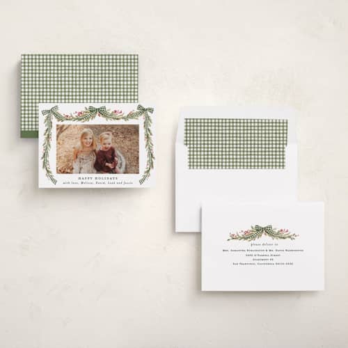 This is a pine holiday photo cards with standard by Sarah Knight called gingham ribbon garland printing on recycled smooth signature in standard