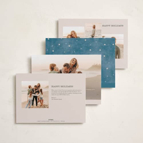 This is a cream holiday photo cards with standard by Pixel and Hank called christmas stamped printing on recycled smooth signature in standard