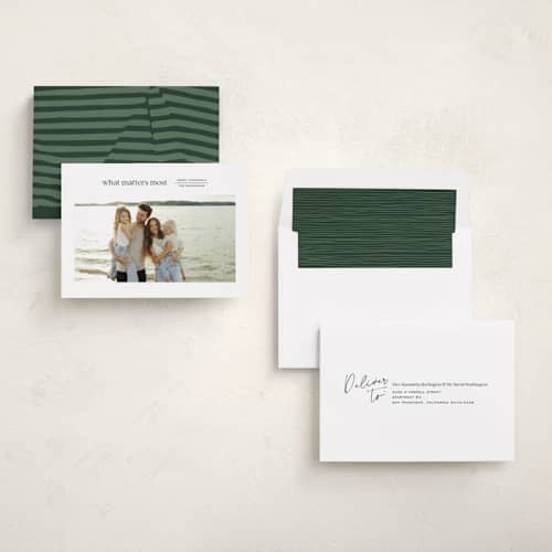 This is a spruce holiday photo cards with standard by Annie Clark called reflection printing on recycled smooth signature in standard