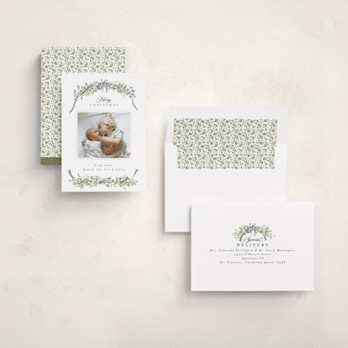 This is a blue spruce holiday photo cards with standard by Everett Paper Goods called boughs of pine printing on recycled smooth signature in standard
