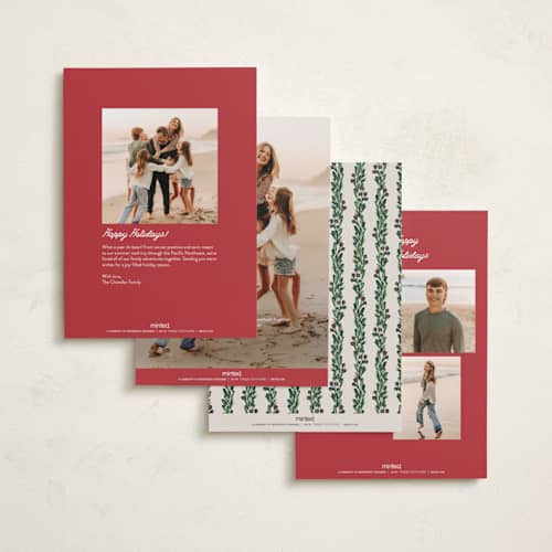 This is a holly berry holiday photo cards with standard by Claudia Orengo called mistletoe printing on recycled smooth signature in standard