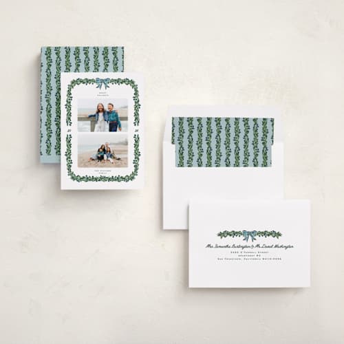 This is a garland holiday photo cards with standard by Claudia Orengo called mistletoe printing on recycled smooth signature in standard