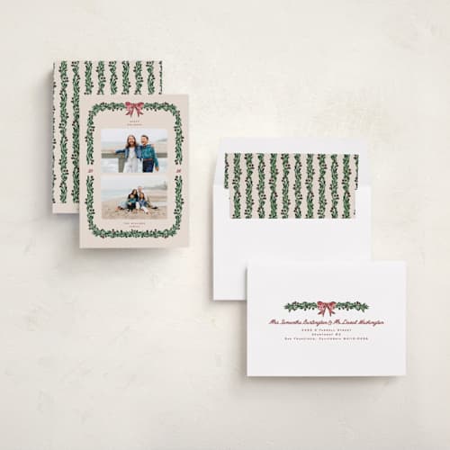 This is a holly berry holiday photo cards with standard by Claudia Orengo called mistletoe printing on recycled smooth signature in standard