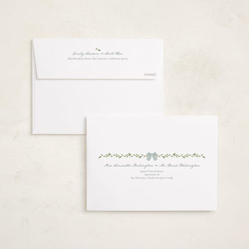 This is a coastal holiday photo cards with standard by Susan Moyal called holiday bows printing on recycled smooth signature in standard