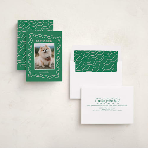 This is a mistletoe holiday photo cards with standard by Vera Lim called wiggly lines printing on recycled smooth signature in standard