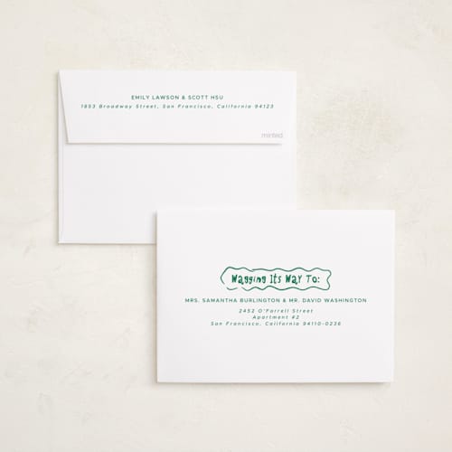 This is a mistletoe holiday photo cards with standard by Vera Lim called wiggly lines printing on recycled smooth signature in standard