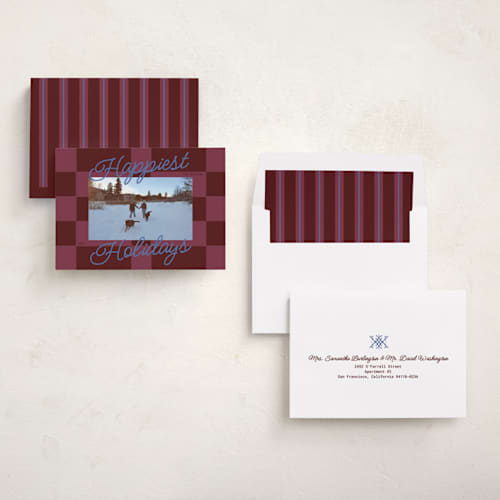 This is a burgundy holiday photo cards with standard by Inkblot Design called cozy checkers printing on recycled smooth signature in standard