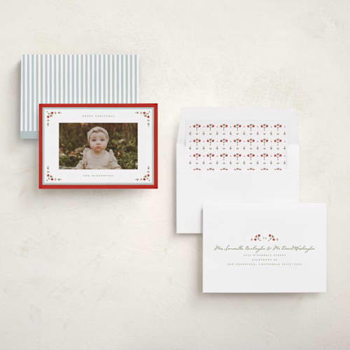 This is a holly berry holiday photo cards with standard by Wildfield Paper Co called laurel border printing on recycled smooth signature in standard